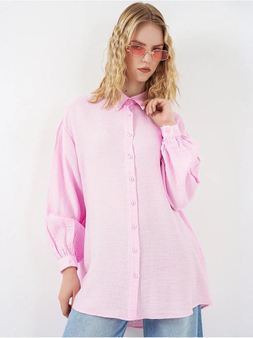 Blouse longue oversize texturée avec col chemise bdart - Kiabi Blouse longue oversize texturée avec col chemise bdart - Kiabi