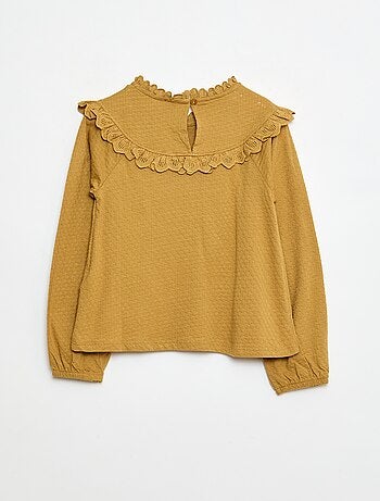 Blouse manches longues col rond avec plastron volanté avec broderies