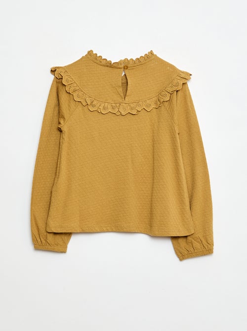 Blouse manches longues col rond avec plastron volanté avec broderies - Kiabi