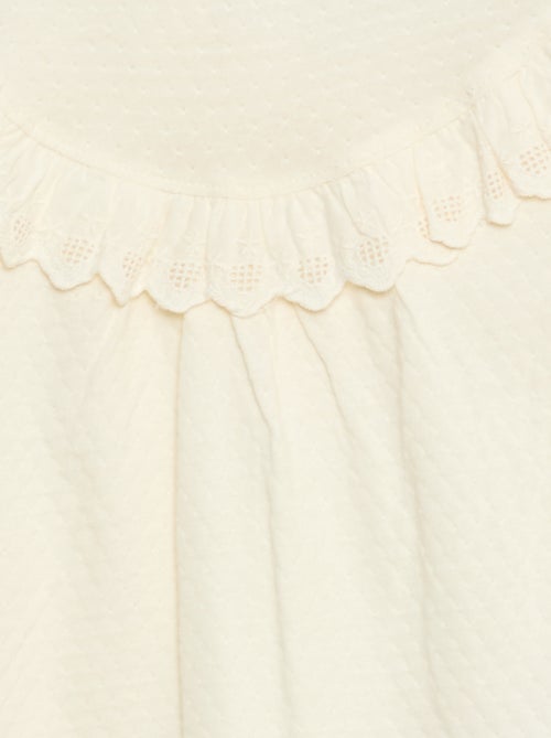 Blouse manches longues col rond avec plastron volanté avec broderies - Kiabi