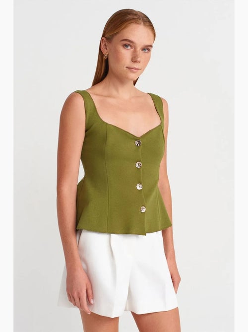 Blouse peplum sans manches ajustée dilvin - Kiabi Blouse peplum sans manches ajustée dilvin - Kiabi