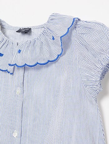 Blouse rayée à manches courtes et base volantée