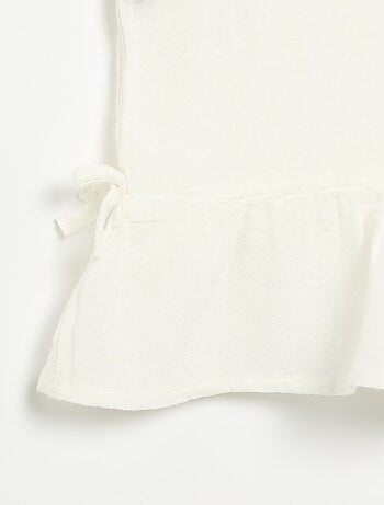 Blouse rayée avec nœuds fantaisie