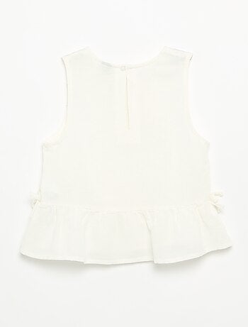 Blouse rayée avec nœuds fantaisie