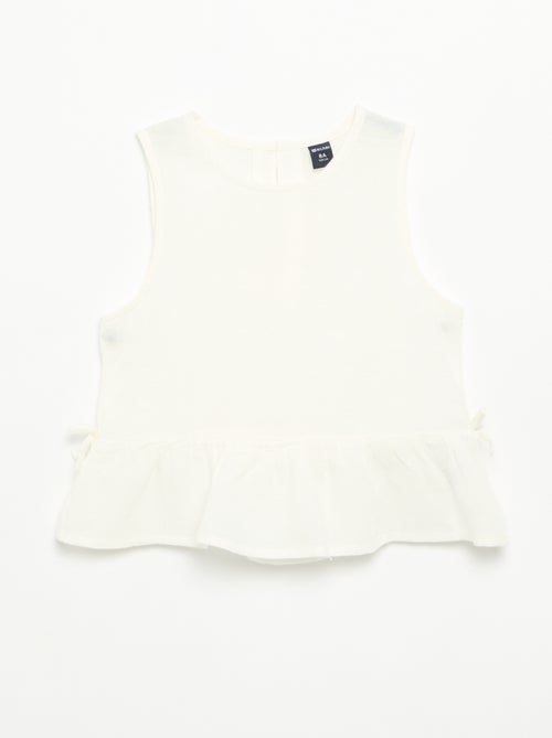 Blouse rayée avec nœuds fantaisie - Kiabi Blouse rayée avec nœuds fantaisie - Kiabi