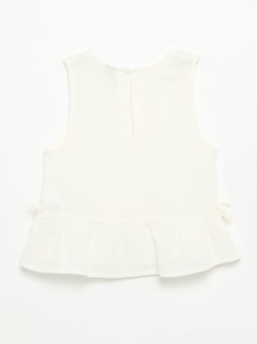 Blouse rayée avec nœuds fantaisie - Kiabi Blouse rayée avec nœuds fantaisie - Kiabi
