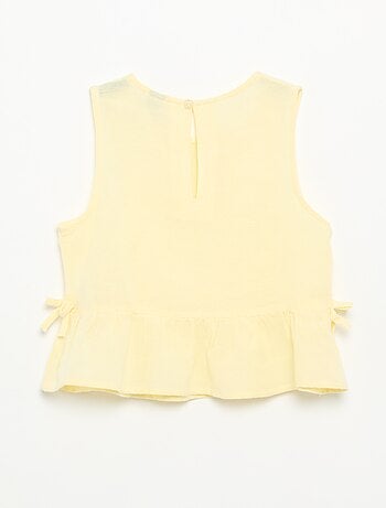Blouse rayée avec nœuds fantaisie