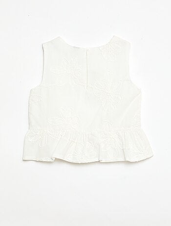 Blouse sans manches avec broderies fleuries