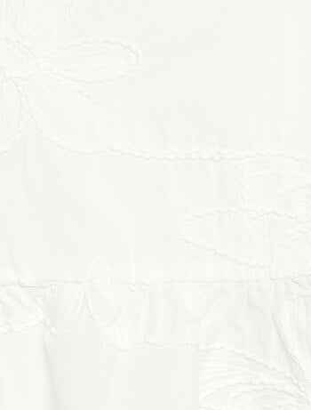 Blouse sans manches avec broderies fleuries