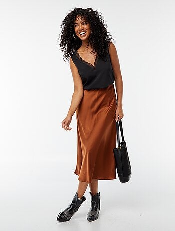 Blouse sans manches avec encolure en dentelle
