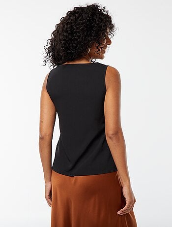 Blouse sans manches avec encolure en dentelle