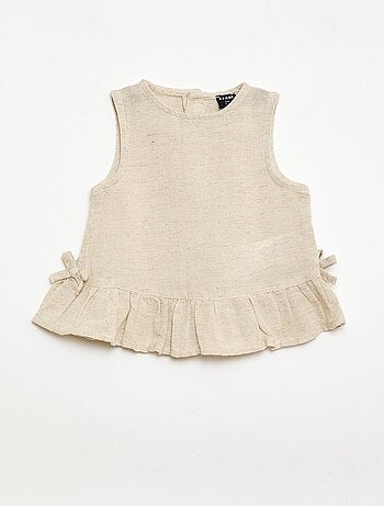 Blouse sans manches avec volants et nœuds