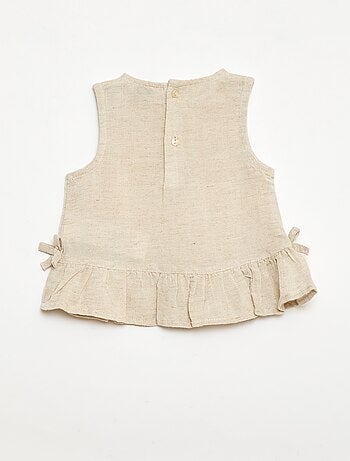 Blouse sans manches avec volants et nœuds