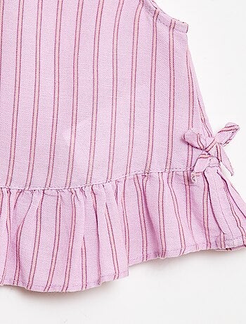 Blouse sans manches avec volants et nœuds