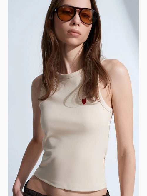 Blouse sans manches cintrée avec broderie dilvin - Kiabi Blouse sans manches cintrée avec broderie dilvin - Kiabi