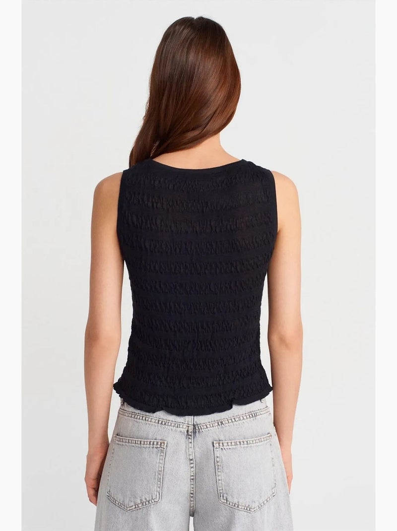 Blouse sans manches côtelée à encolure bateau dilvin Noir - Kiabi