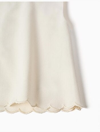 Blouse sans manches évasée à ourlet festonné