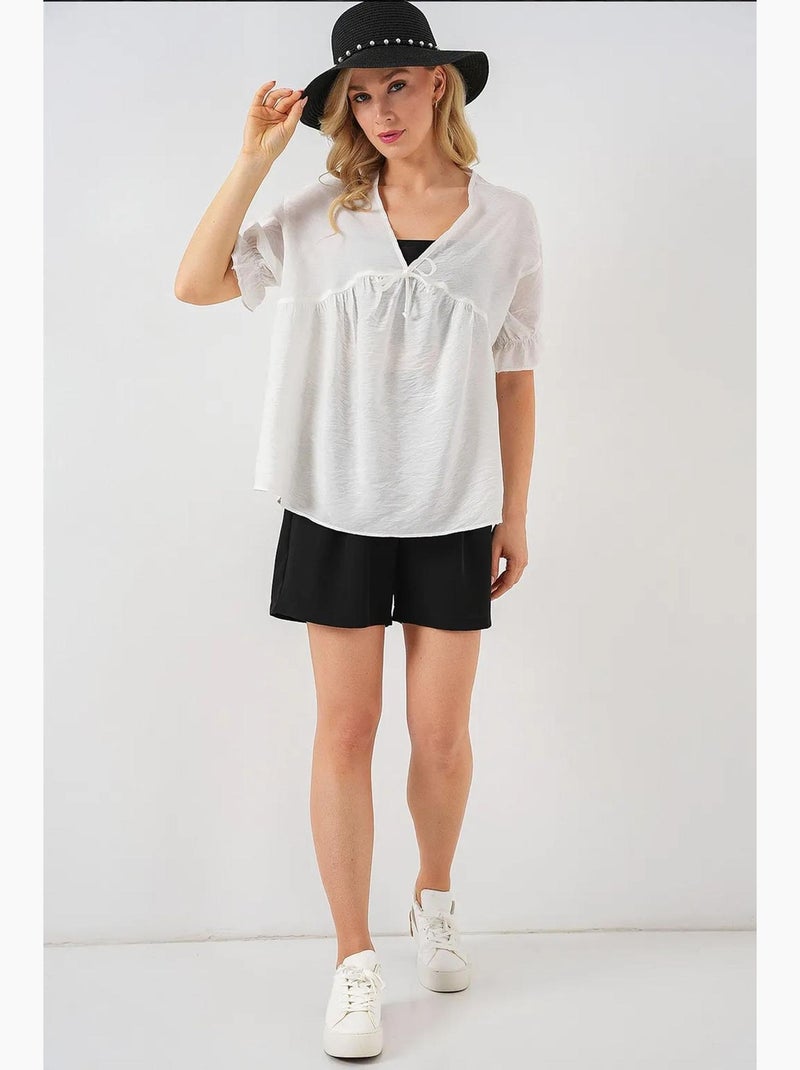 Blouse texturée à col en v et nœud bdart Blanc - Kiabi