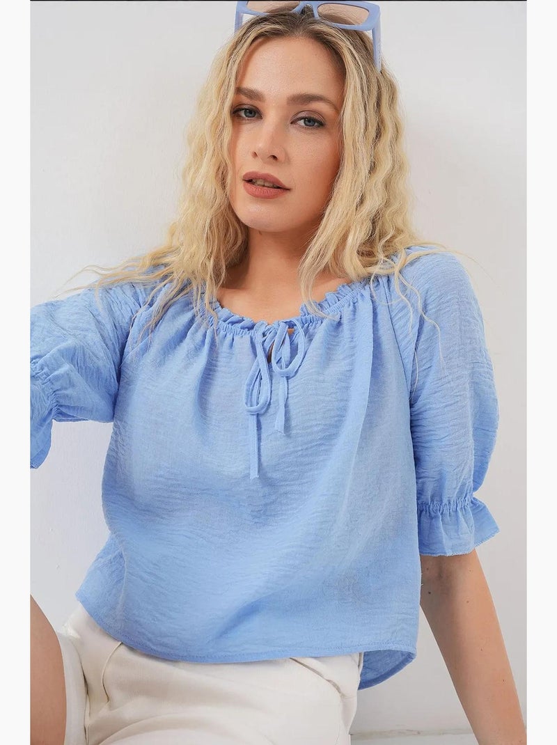 Blouse texturée courte à col bateau détail pompons bdart Bleu clair - Kiabi