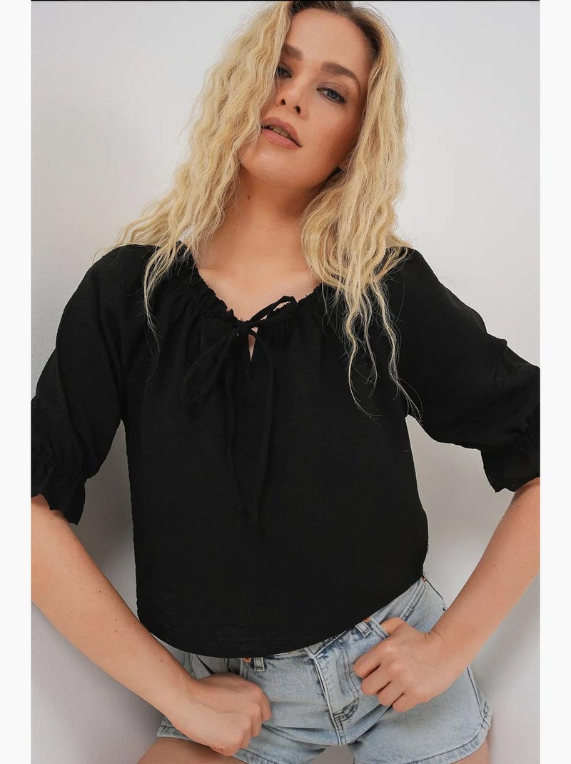 Blouse texturée courte à col bateau détail pompons bdart Noir - Kiabi