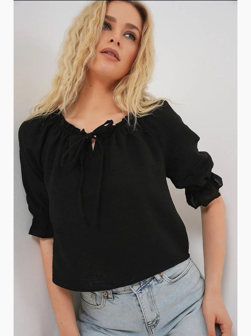 Blouse texturée courte à col bateau détail pompons bdart Noir - Kiabi