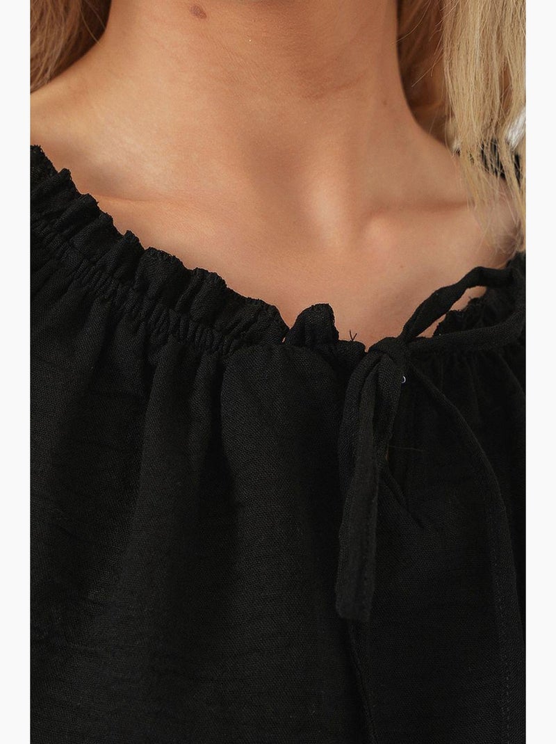 Blouse texturée courte à col bateau détail pompons bdart Noir - Kiabi