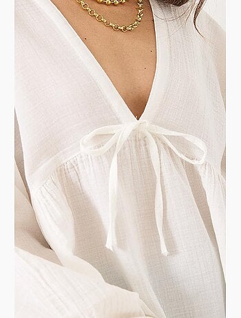 Blouse texturée courte à col en v et nœud lucci