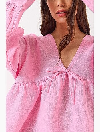 Blouse texturée courte à col en v et nœud lucci