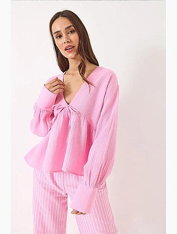 Blouse texturée courte à col en v et nœud lucci