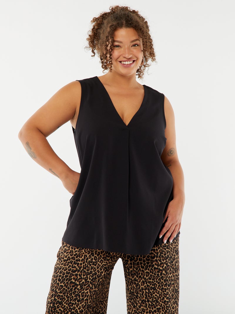 Blouse uni avec couture fantaisie au col noir - Kiabi