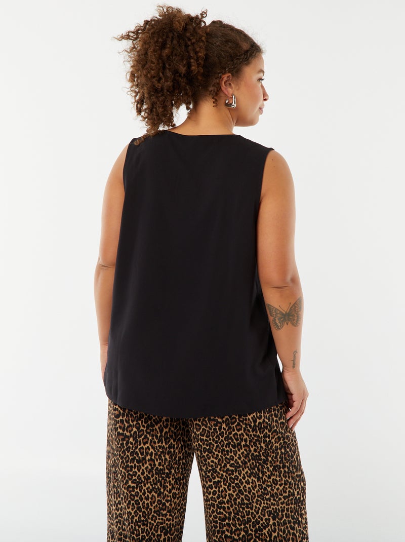 Blouse uni avec couture fantaisie au col noir - Kiabi