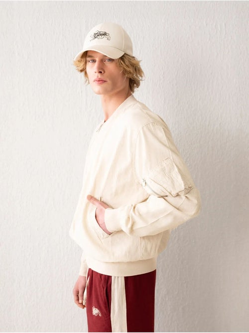 Blouson aviateur en coton avec fermeture éclair et poche giesto - Kiabi Blouson aviateur en coton avec fermeture éclair et poche giesto - Kiabi