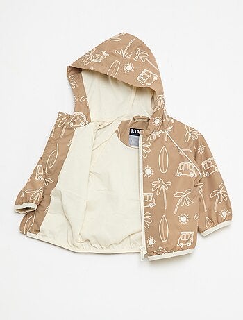 Blouson coupe vent à capuche all-over