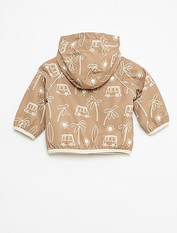 Blouson coupe vent à capuche all-over