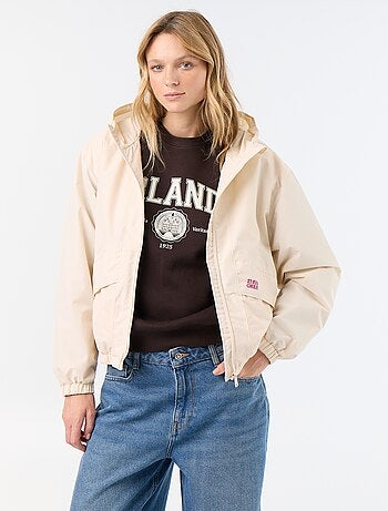 Blouson coupe-vent à capuche