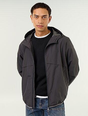 Blouson coupe-vent à capuche déperlant