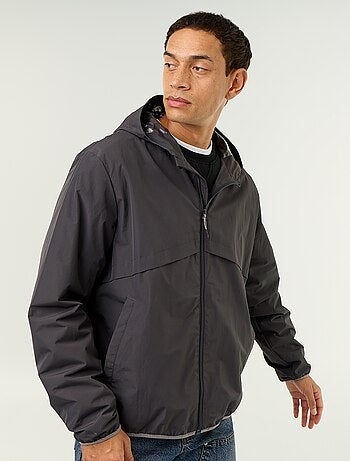 Blouson coupe-vent à capuche déperlant
