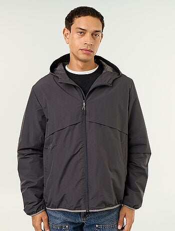 Blouson coupe-vent à capuche déperlant
