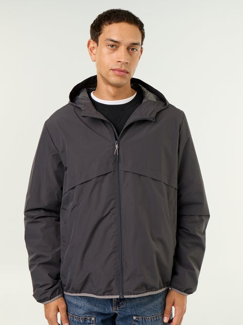 Blouson coupe-vent à capuche déperlant - Kiabi Blouson coupe-vent à capuche déperlant - Kiabi