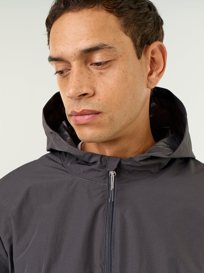 Blouson coupe-vent à capuche déperlant Noir - Kiabi