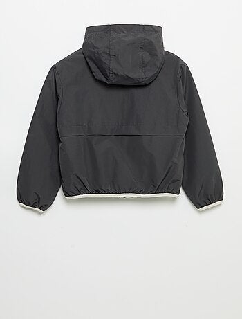 Blouson coupe-vent à capuche
