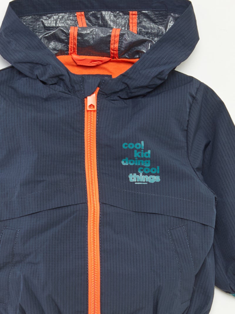 Blouson coupe-vent déperlant à capuche Bleu - Kiabi
