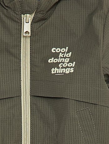 Blouson coupe-vent déperlant à capuche