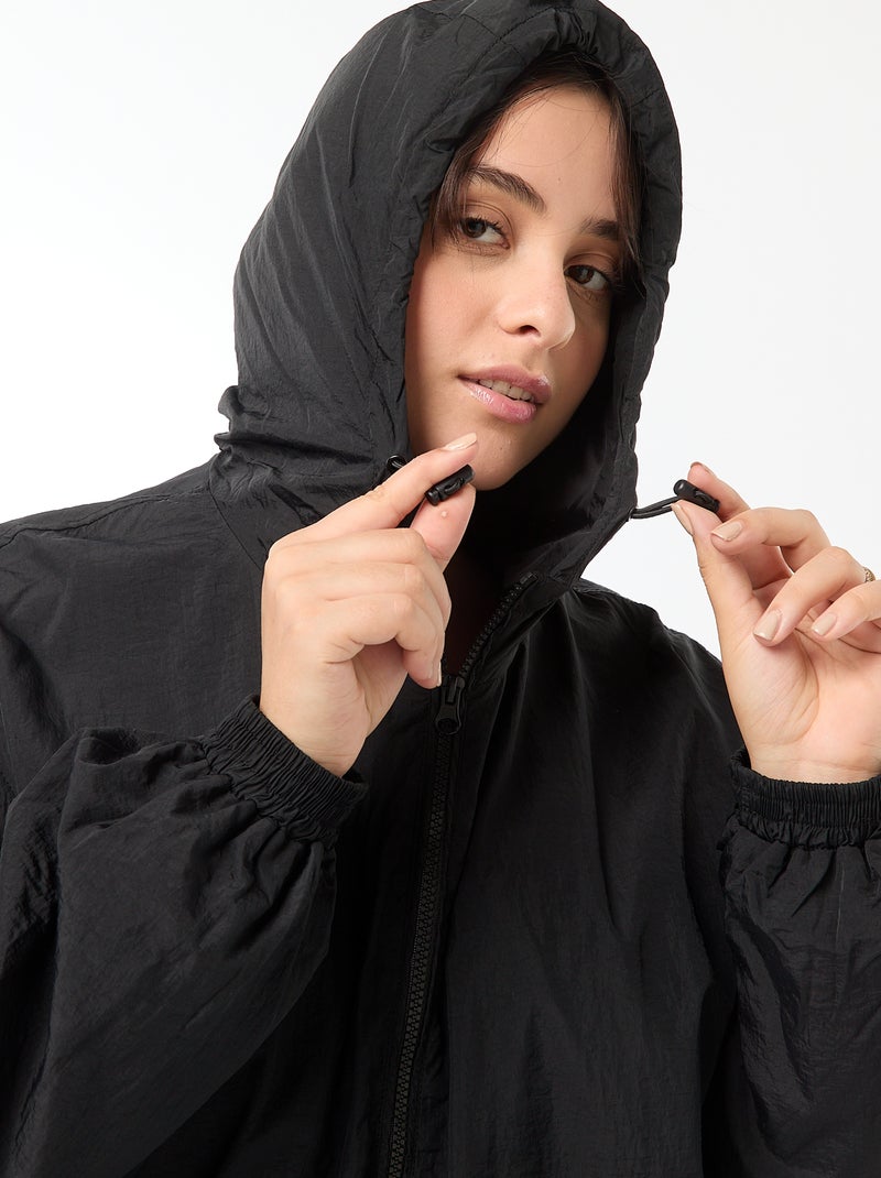 Blouson déperlant style coupe-vent à capuche Noir - Kiabi