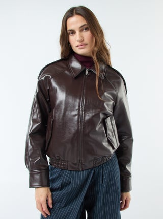 Blouson en simili avec ouverture zippée
