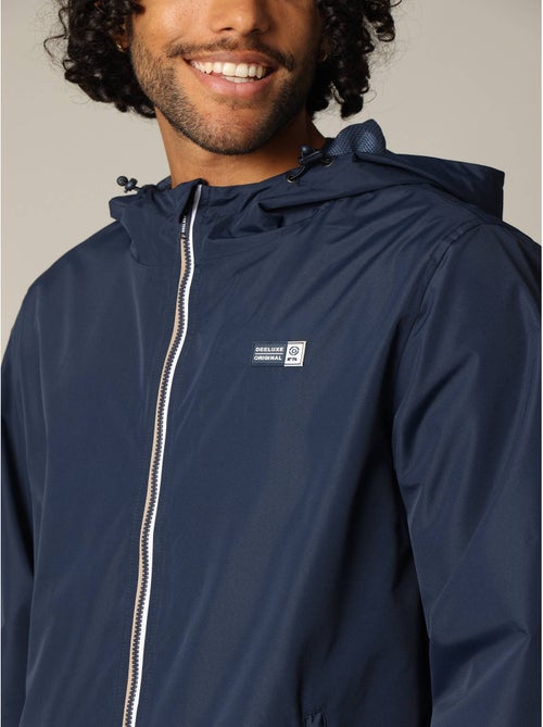 Blouson en toile enduite avec capuche doublée et manches longues 'Deeluxe' - Kiabi