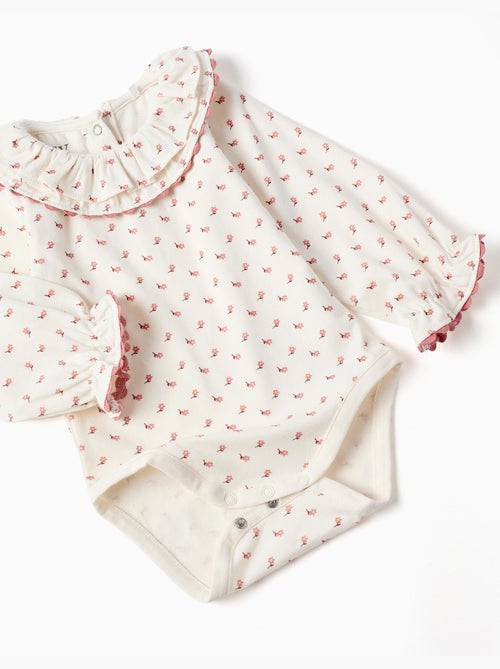 Body à motif fleuri + robe salopette - Kiabi Body à motif fleuri + robe salopette - Kiabi