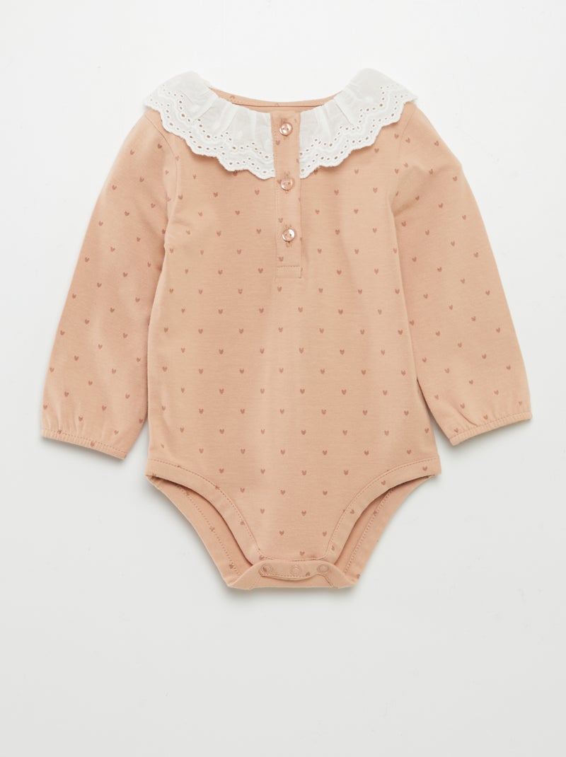 Pull bébé en tricot avec fleurs brodées rose