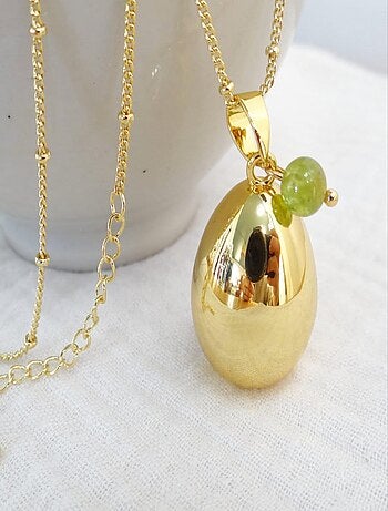 Bola de grossesse goutte or, Août Péridot