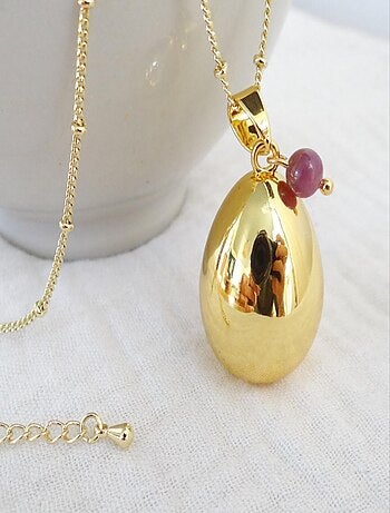 Bola de grossesse goutte or, Juillet Rubis